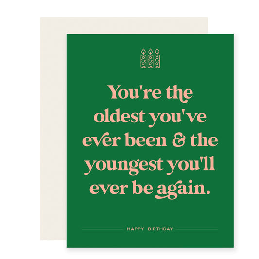 Green card featuring salmon colored text with a humorous birthday message: 'You're the oldest you've ever been & the youngest you'll ever be again.  Happy Birthday!'