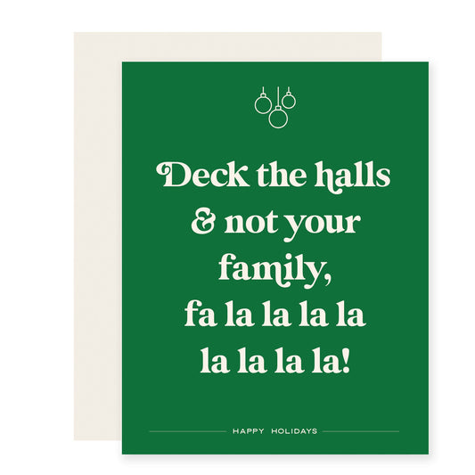 Green card with white text that reads 'Deck the halls and not your family, fa la la la la la la la la! Happy Holidays'. 