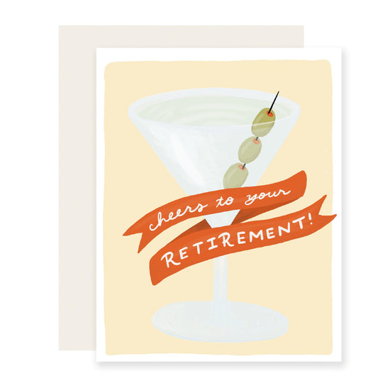 A congratulatory retirement card featuring an elegantly illustrated martini glass with olives, accompanied by the message 'Cheers to your retirement.' A perfect way to celebrate this milestone.